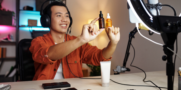 Influencer Advertising Skincare Products at Table