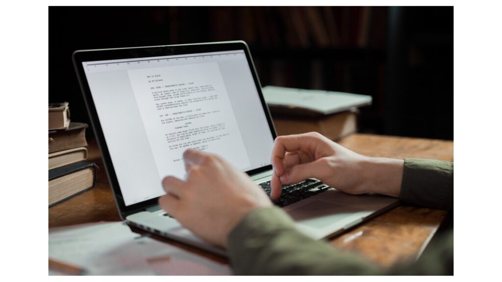 women on laptop writing content