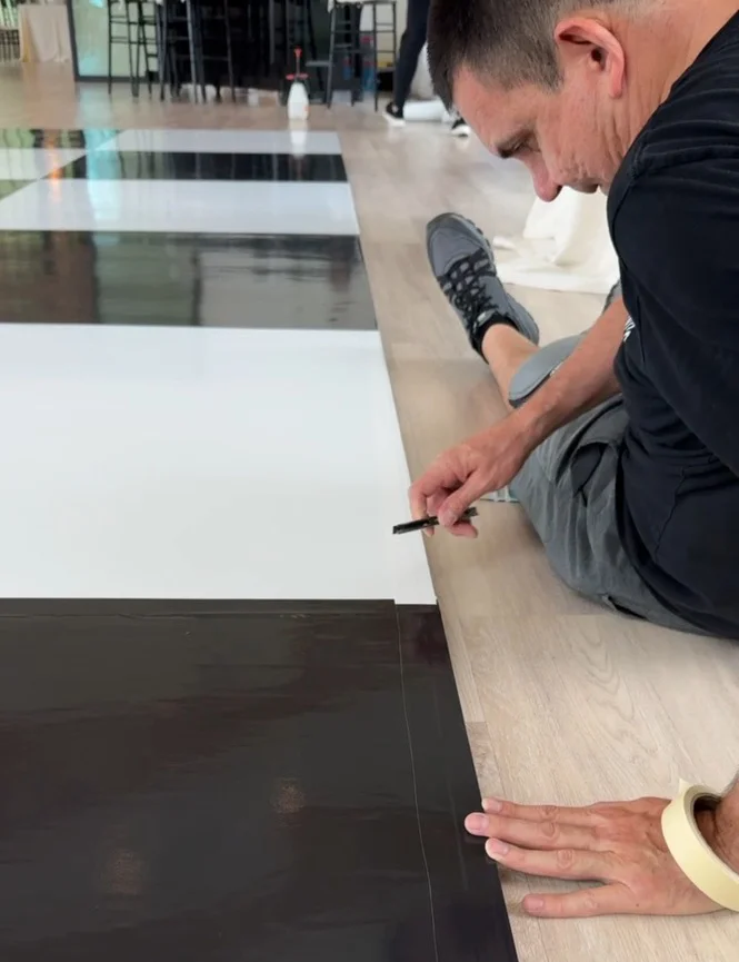 Austin Sign Co. installing custom decals for event