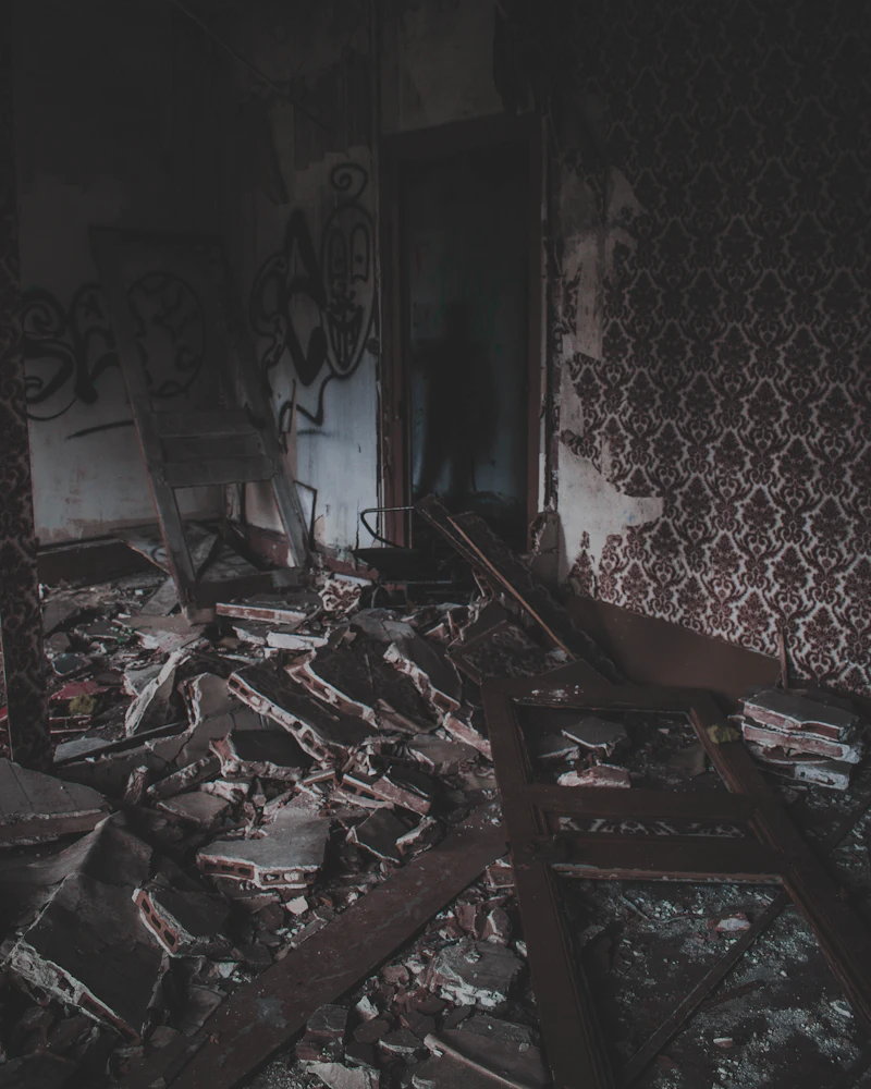Fire-damaged room with charred walls