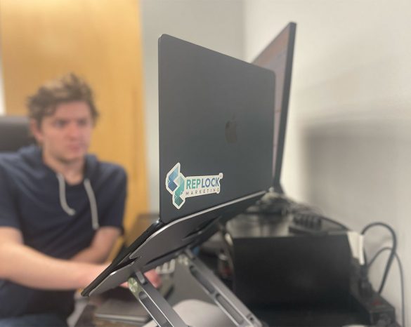 Rep-Lock-Marketing-sticker-on-computer