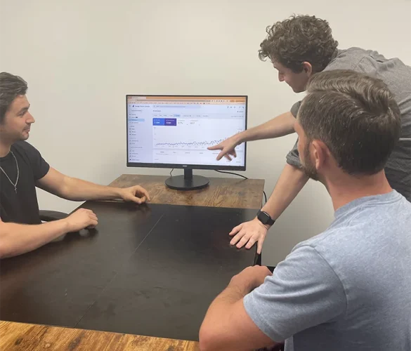 analytics team going over marketing metrics