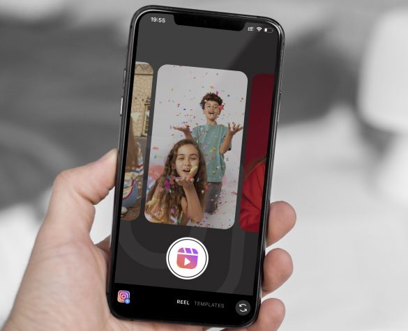 high-angle-hand-holding-smartphone