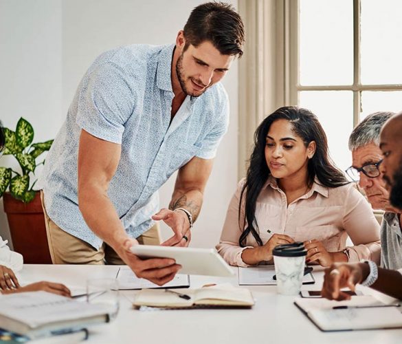 Marketing team working on strategy with client